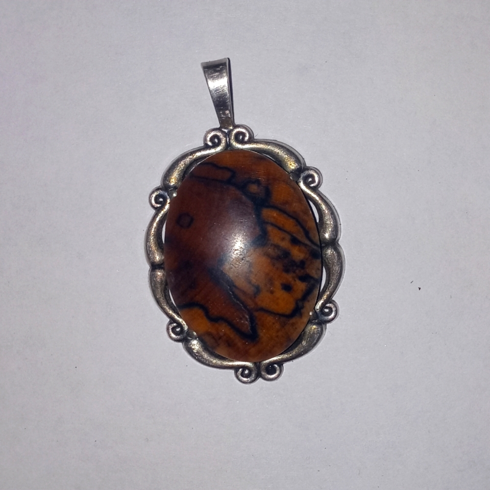 Unique Japanese tiger eye gem stone. Sterling silver.
